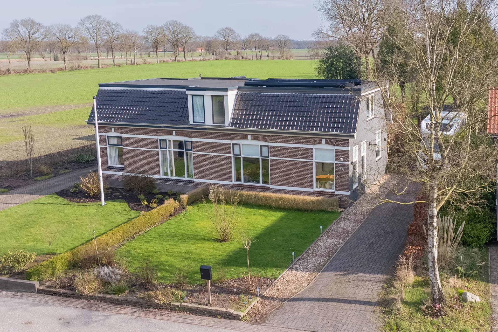 Vastgoedfotograaf Drachten, luchtopname boven Friesland